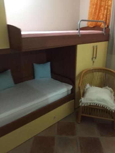 a couple of bunk beds in a room at Villa Pierina in San Teodoro