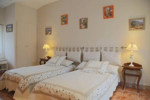 Lova arba lovos apgyvendinimo įstaigoje Elegante villa de 180m3 avec la superbe vue