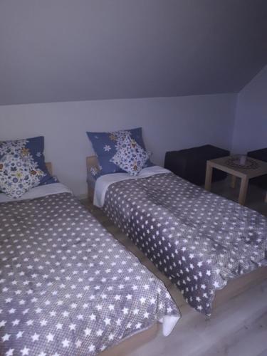 Cama o camas de una habitación en Agroturystyka Zielone Wzgorze