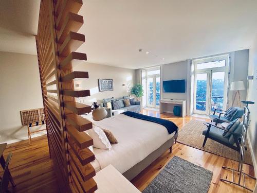 Ένα ή περισσότερα κρεβάτια σε δωμάτιο στο Vitoria's Terrace Apartments