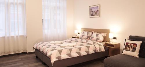 Ένα ή περισσότερα κρεβάτια σε δωμάτιο στο Apartmani Sterija
