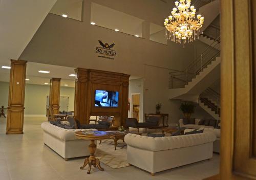 Sky Palace Hotelにあるテレビまたはエンターテインメントセンター