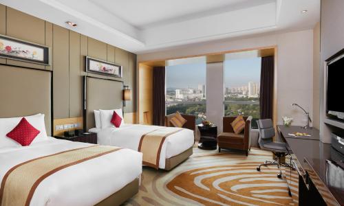 Postel nebo postele na pokoji v ubytování InterContinental Tangshan by IHG