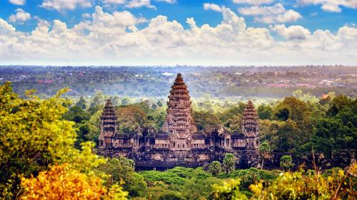 a group of temples on a hill with trees at Aurea Central Hotel in Phnom Penh