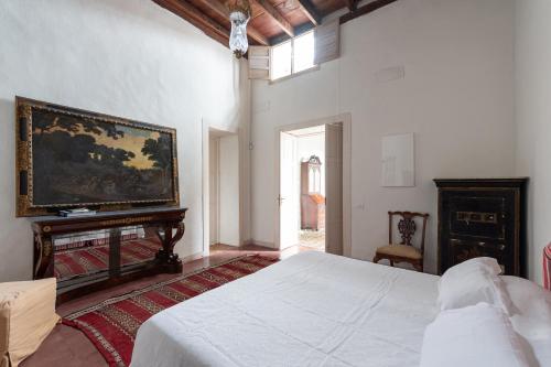 En eller flere senge i et værelse på Villa Hacienda del Batán