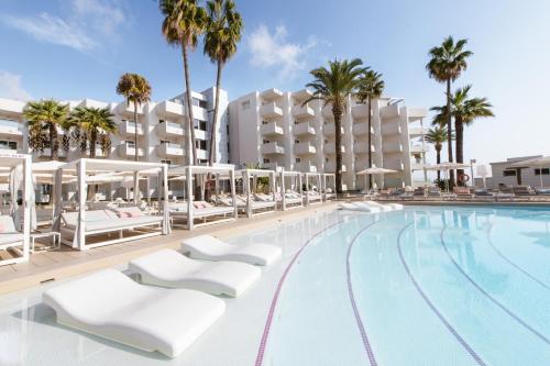 an image of the swimming pool at the resort at Hotel Garbi Ibiza & Spa in Playa d'en Bossa