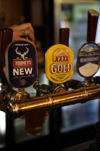 a group of different types of labels on a bar at Criterion Hotel Sydney in Sydney