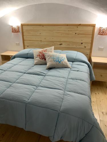 Ένα ή περισσότερα κρεβάτια σε δωμάτιο στο Noi Due