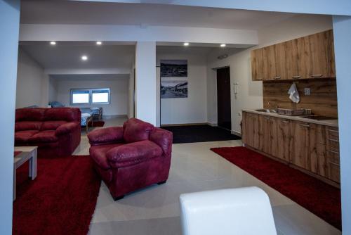 Posezení v ubytování City Center Apartments