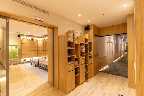 Postel nebo postele na pokoji v ubytování CHO Stay Capsule Hotel-Taoyuan Airport T2