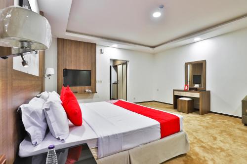 Een bed of bedden in een kamer bij نجمة نوارة للوحدات الفندقية