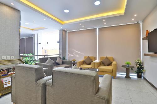 Posezení v ubytování شقق نجمة نوارة للشقق المخدومة