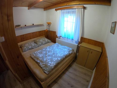 Postel nebo postele na pokoji v ubytování Apartmán U Sjezdovky