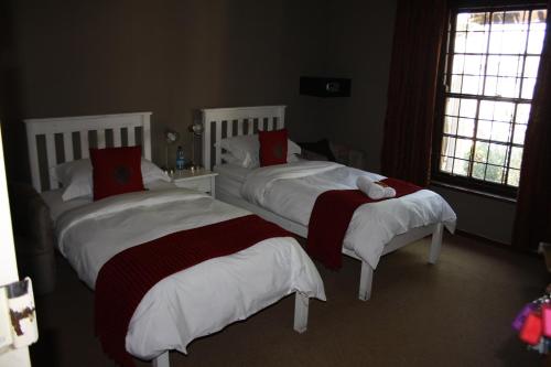 Katil atau katil-katil dalam bilik di The Vinelands on Alpha Guest House