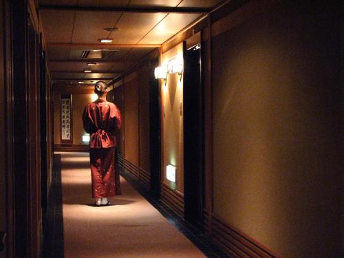 a mannequin standing in a hallway in a room at Konjakutei in Aizuwakamatsu