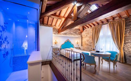 TV a/nebo společenská místnost v ubytování Agri Resort & SPA Le Colline del Paradiso
