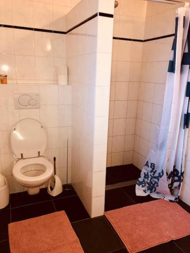 Koupelna v ubytování Le Doux Ny