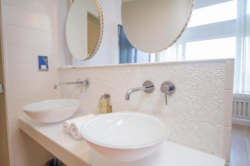 Salle de bains dans l'établissement Connemara Sands Hotel & Spa