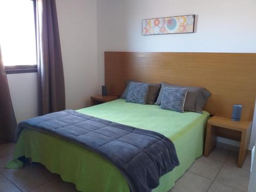 Ένα ή περισσότερα κρεβάτια σε δωμάτιο στο Residences La Tonnara