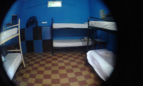 Andamundos Hostel tesisinde bir ranza yatağı veya ranza yatakları