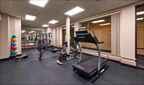 a gym with two tread machines and a treadmill at Four Queens Hotel and Casino in Las Vegas