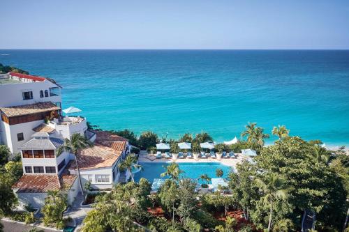 Vaade basseinile majutusasutuses La Samanna, A Belmond Hotel, St Martin või selle lähedal