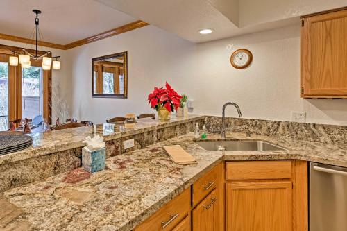 a kitchen with a sink and a counter top at Deck with Forest Views Incline Village Townhome in Incline Village