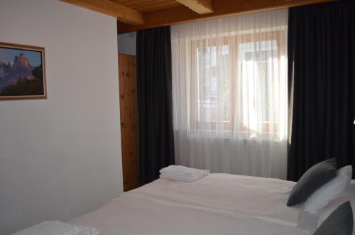 Ένα ή περισσότερα κρεβάτια σε δωμάτιο στο Apartment Snow