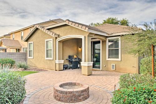 a house with a brick patio in front of it at Dog-Friendly Retreat with Patio and Yard in Gilbert! in Gilbert