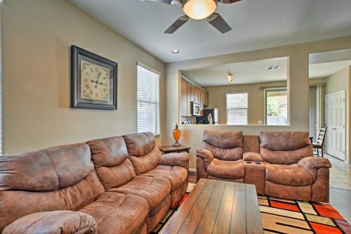 a living room with a couch and two chairs at Dog-Friendly Retreat with Patio and Yard in Gilbert! in Gilbert