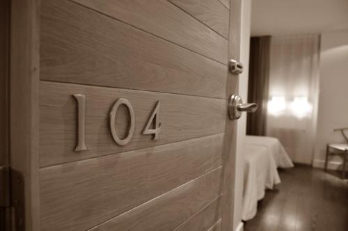 Postel nebo postele na pokoji v ubytování Hotel Valdecoro