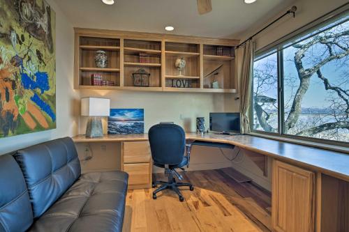 a home office with a desk and a window at Casa dAmore Extravagant Lakefront Villa! in Granite Bay