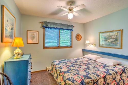 a bedroom with a bed and a window at Clearwater Lake Getaway with Shared Pool and Boat Dock in Annandale