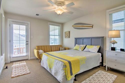 a bedroom with a bed and a ceiling fan at 3 Mi to Fenwick Island Beach Luxe Bungalow in Peppers Landing
