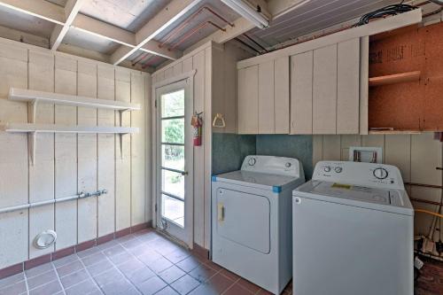 a laundry room with a washer and dryer at Gilroy Home with Deck on 20 Acres, 7 Mi to Downtown! in Gilroy