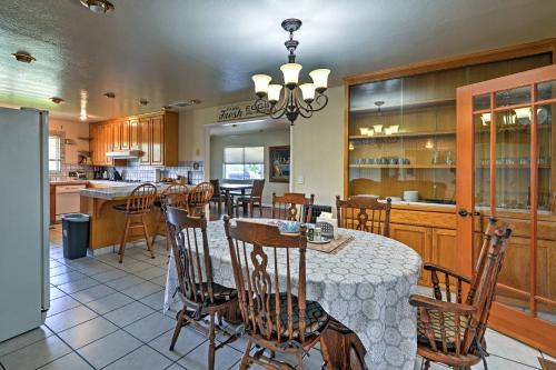 a kitchen and dining room with a table and chairs at Gilroy Home with Deck on 20 Acres, 7 Mi to Downtown! in Gilroy