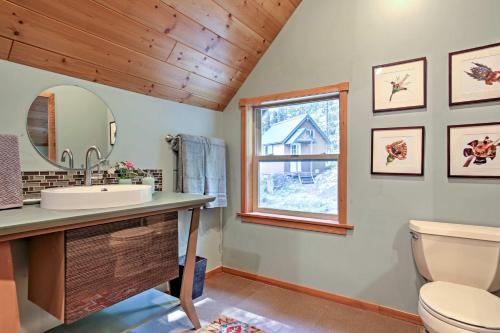 a bathroom with a sink and a toilet at Tamarack Haus Hot Tub and EV Charging Walk Dtwn! in Leavenworth