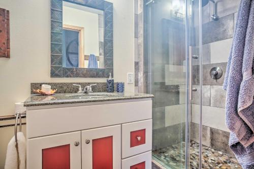a bathroom with a sink and a shower at Modern South Whidbey House - Steps to Tidal Flats! in Clinton