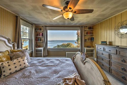 a bedroom with a bed and a ceiling fan at Waterfront Port Angeles Home with Harbor Views in Port Angeles