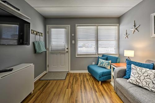 a living room with a couch and a table at North Wildwood Condo with Pool, Walk to Boardwalk! in North Wildwood
