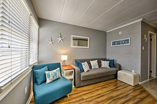 a living room with a couch and a table at North Wildwood Condo with Pool, Walk to Boardwalk! in North Wildwood