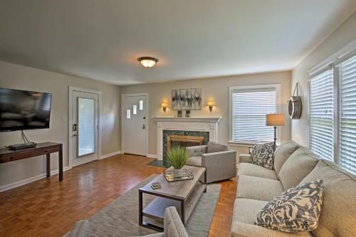 a living room with a couch and a fireplace at Indianapolis Vacation Rental - Walk to the IMS! in Indianapolis