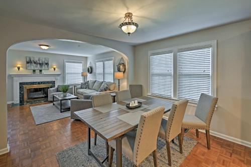 a dining room with a table and a living room at Indianapolis Vacation Rental - Walk to the IMS! in Indianapolis