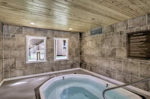 a jacuzzi tub in the corner of a room at Ski Shuttle and Mountain Views Keystone Resort Home in Keystone