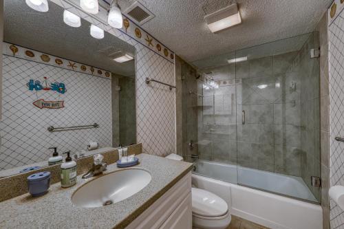 a bathroom with a sink and a shower and a toilet at Island Club 1 in Hilton Head Island