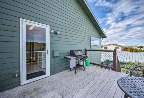 a patio with a bbq grill on a deck at Charming Sequim House with Olympic Peninsula Views! in Sequim