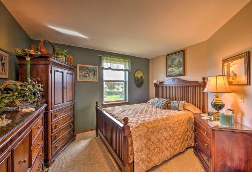 a bedroom with a bed and a window at Charming Sequim House with Olympic Peninsula Views! in Sequim
