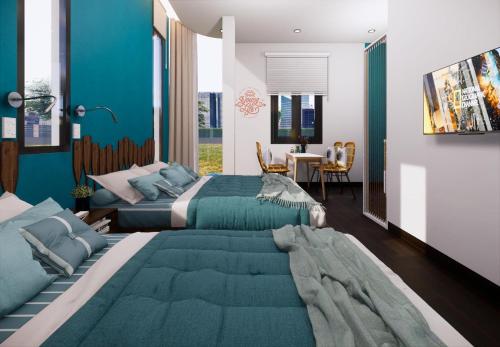 a bedroom with two beds and a dining room with a table at Sun&Sea House Homestay in Quy Nhon