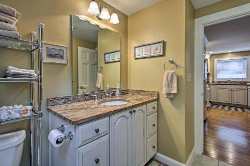 a bathroom with a sink and a mirror at Lovely Kennebunk Guesthouse - 2 Mi to Dock Square! in Kennebunk