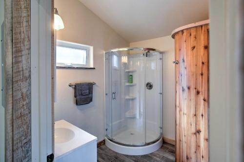 a bathroom with a shower and a sink at Semi-Private Mancos Cabin on 80 Acres with Mtn View! in Dolores